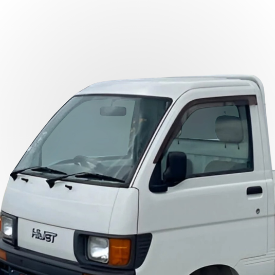 A close-up of the windscreen on a S110 Daihatsu Hijet