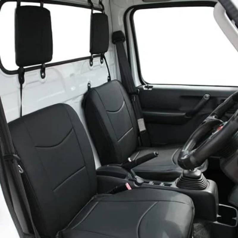 Load image into Gallery viewer, Davey Motor Group's black leather seat covers installed in a white Daihatsu Hijet