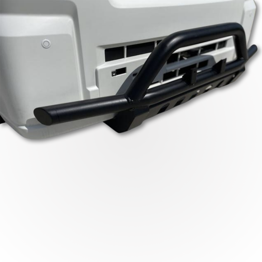 The matte black mini truck nudge bar shown installed on a white Daihatsu Hijet