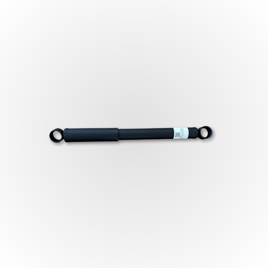 A rear Shock/Strut compatible with the Daihatsu Hijet shown from the side