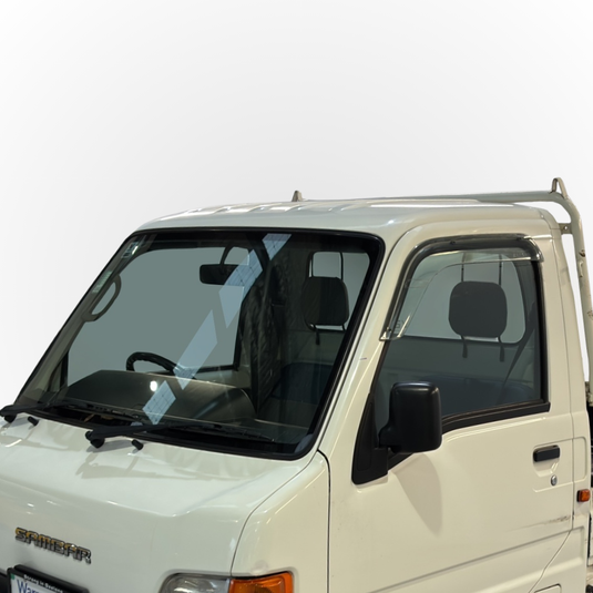 A close-up of the windscreen on a HS4 Subaru Sambar, highlighting the clean windscreen