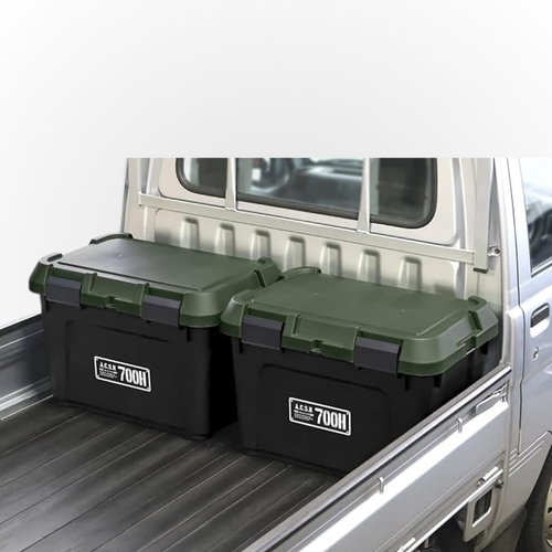 Two Heavy Duty Storage Boxes shown sitting perfectly side by side in the back of a silver Daihatsu Hijet
