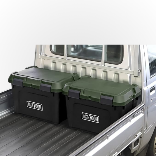 Two Heavy Duty Storage Boxes shown sitting perfectly side by side in the back of a silver Daihatsu Hijet
