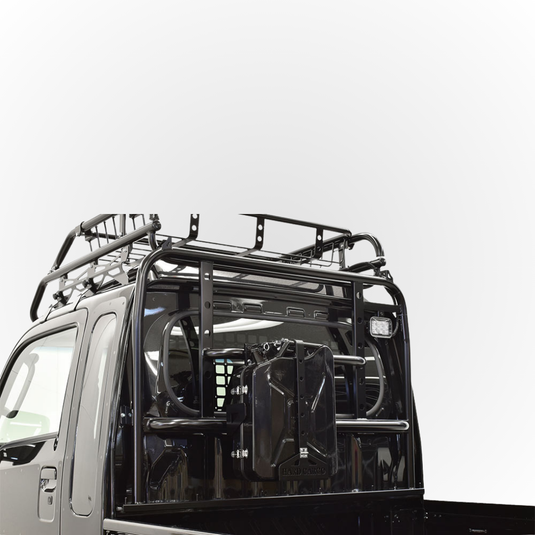 The Hard Cargo Jerry Can Holder shown installed on the back of a Daihatsu Hijet with jerry can attached