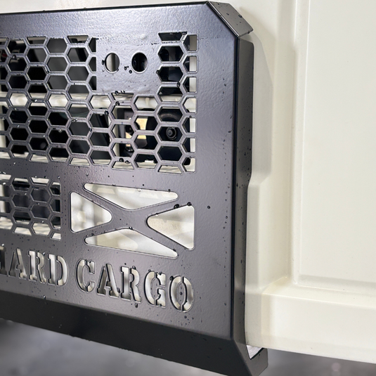 A Hard Cargo Skid Grille shown installed on a Daihatsu Hijet
