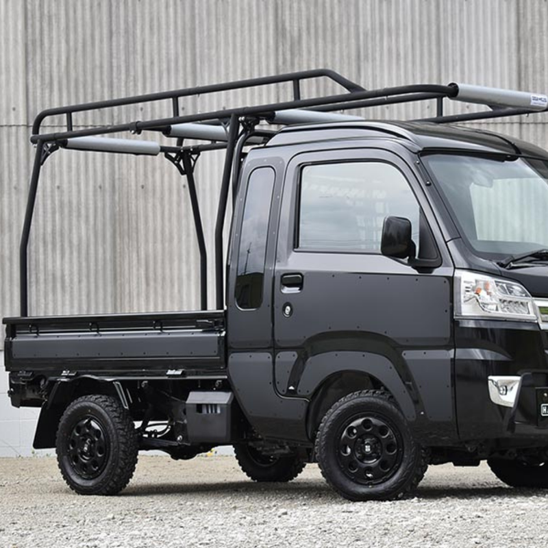 Load image into Gallery viewer, A Hard Cargo Work Carrier installed on a black Daihatsu Hijet
