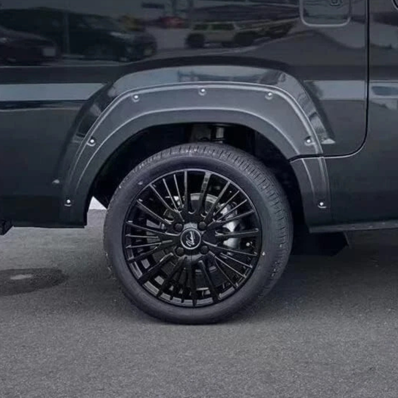 Load image into Gallery viewer, Davey Parts &amp; Accessories Daihatsu Hijet Overfender attached to black Hijet rear wheel
