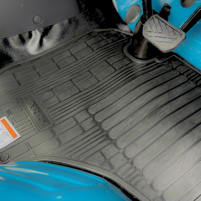 Load image into Gallery viewer, The Davey Motor Group Suzuki Carry Standard Rubber Floor Mats shown installed in a teal coloured Suzuki Carry
