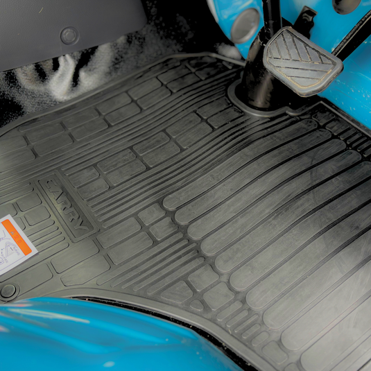 The Davey Motor Group Suzuki Carry Standard Rubber Floor Mats shown installed in a teal coloured Suzuki Carry