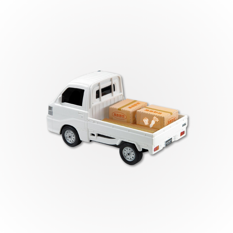 Load image into Gallery viewer, The White Davey Motor Group toy Daihatsu Hijet with a tray of boxes shown from the back of the truck
