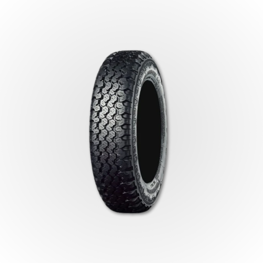 A single Yokohama Geolandar tyre shown from the front to show the tread pattern clearly