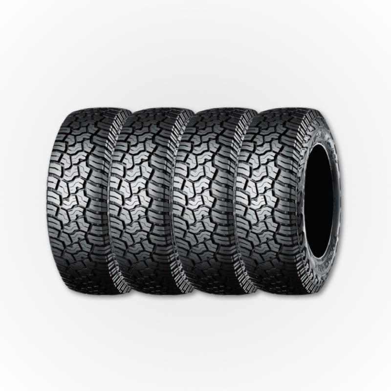 Load image into Gallery viewer, Four Yokohama Geolandar tyres side-by-side, all showing the tread pattern of the tyre

